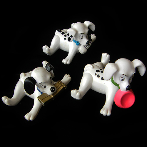 1996 101 Dalmatians — Group of Dogs Spreadeagled, Holding things in mouth